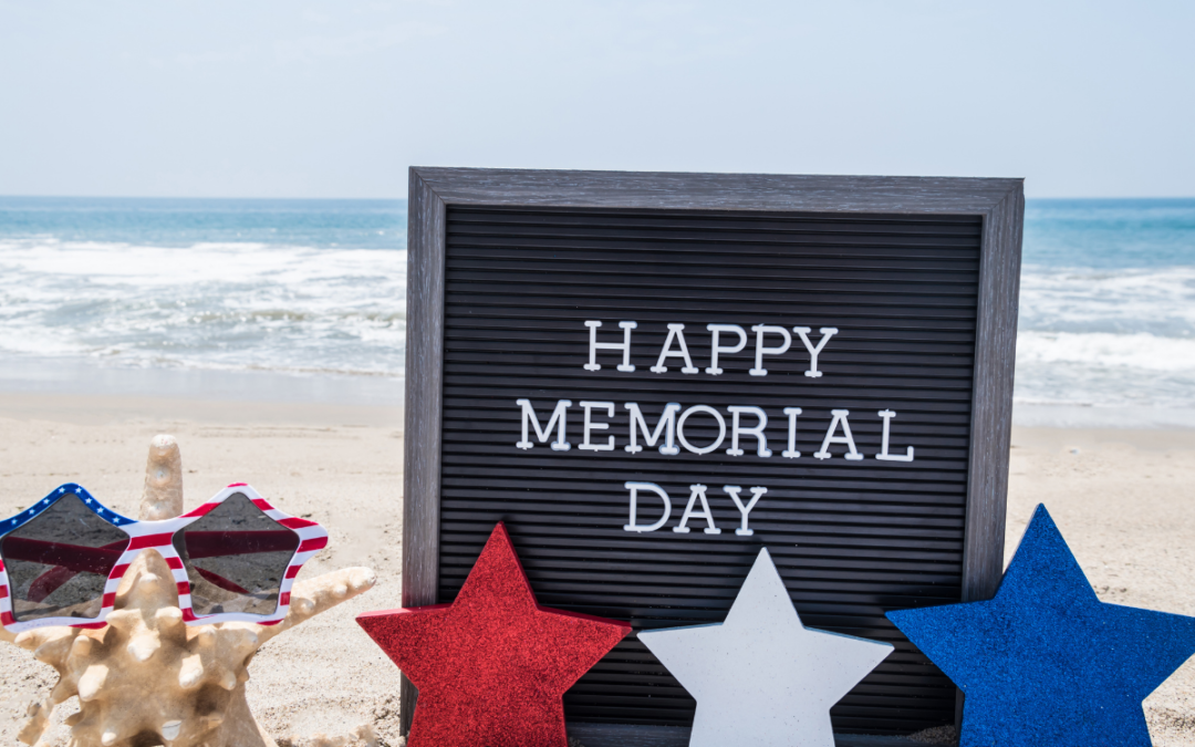 Happy Memorial Day sign at the beach.